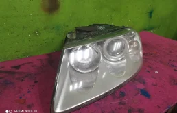 Фара ксенон левая для Volkswagen Touareg 2003 года на фотографиях