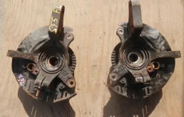 Кулак поворотный левый для Subaru Legacy 2001 года на фотографиях