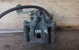 суппорт задний левый ( механический) для Mazda CX 5 KE (JDM) 2012-2016