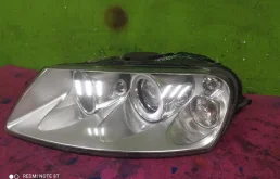 Фара ксенон левая для Volkswagen Touareg 2003 года на фотографиях