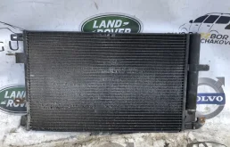 Радиатор кондиционера для Jaguar XF 2014 года на фотографиях