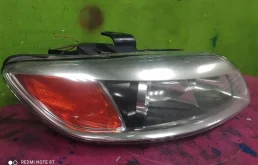 Фара ксенон левая для Audi Q7 2009 года на фотографиях