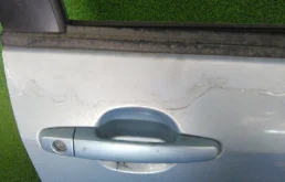 Дверь передняя правая для Toyota Corolla 2003 года на фотографиях