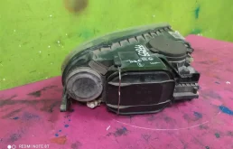 Фара ксенон левая для Volkswagen Touareg 2003 года на фотографиях