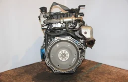 Двигатель без навесного для Kia Carnival 2000 года на фотографиях