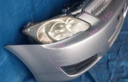 Бампер для Toyota Corolla 2003 года на фотографиях