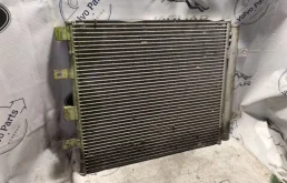 Радиатор кондиционера для Jaguar XF 2014 года на фотографиях