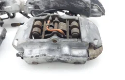 Суппорт задний левый для Audi Q7 2015 года на фотографиях