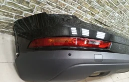 Бампер задний для Audi Q3 2013 года на фотографиях