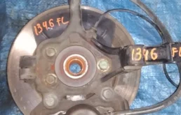 Кулак поворотный левый для Nissan Tiida на фотографиях