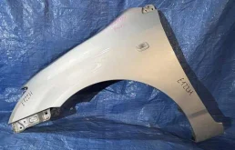 Крылья для Toyota Corolla 2003 года на фотографиях