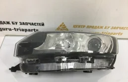 Фара ксенон левая для Skoda Rapid 2014 года на фотографиях