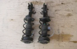 Амортизатор передний левый для Nissan Tiida на фотографиях