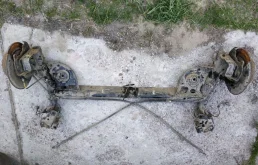 Задняя балка для Nissan Tiida 2013 года на фотографиях