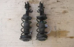 Амортизатор передний левый для Nissan Tiida на фотографиях