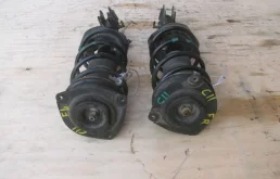 Амортизатор передний левый для Nissan Tiida на фотографиях