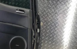 Двери для Mazda CX 7 2010 года на фотографиях