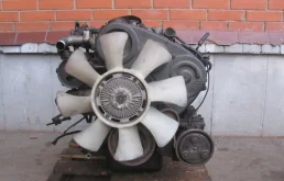 Двигатель без навесного для Mitsubishi L200 2009 года на фотографиях