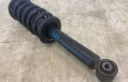 Амортизатор передний левый для Mitsubishi Pajero на фотографиях