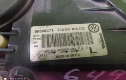 Фара ксенон левая для Volkswagen Touareg 2003 года на фотографиях