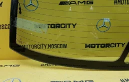 Стекла и зеркала для BMW 7er 1997 года на фотографиях