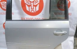 Дверь задняя левая для Volkswagen Touran 2009 года на фотографиях