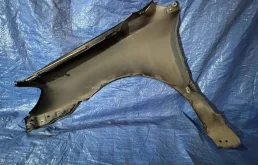 Крылья для Toyota Corolla 2003 года на фотографиях