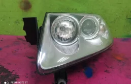 Фара ксенон левая для Volkswagen Touareg 2003 года на фотографиях