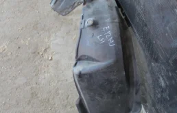 Подкрылок передний левый для Toyota Corolla 2003 года на фотографиях