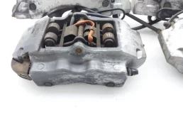 Суппорт задний левый для Audi Q7 2015 года на фотографиях