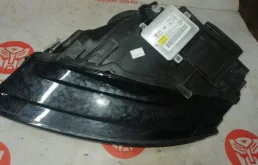 Фара ксенон левая для Audi A5 2010 года на фотографиях