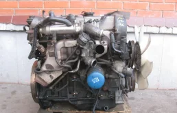 Двигатель без навесного для Mitsubishi L200 2009 года на фотографиях