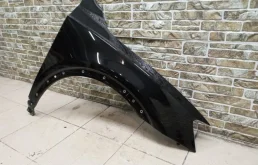 Крылья для Audi Q3 2013 года на фотографиях