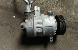 Компрессор кондиционера для Skoda Rapid 2012 года на фотографиях