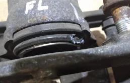 Суппорт передний левый для Suzuki Grand Vitara на фотографиях