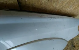 Крыло правое для Subaru Legacy 2009 года на фотографиях