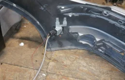 Бампер передний для Volkswagen Touran 2005 года на фотографиях