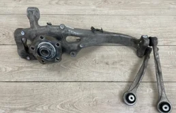 Кулак поворотный левый для Audi Q7 на фотографиях