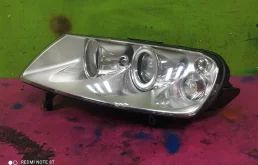 Фара ксенон левая для Volkswagen Touareg 2003 года на фотографиях