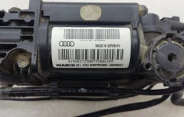 Компрессор пневмоподвески задний для Audi Q7 2008 года на фотографиях
