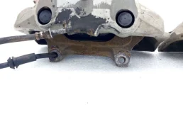 Скоба суппорта передняя для Audi A8 на фотографиях