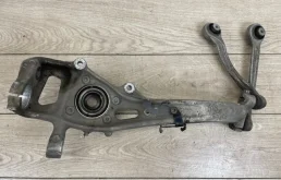 Кулак поворотный левый для Audi Q7 на фотографиях