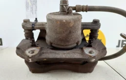 Суппорт передний левый для Suzuki Grand Vitara на фотографиях