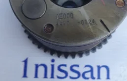 Регулятор фаз газораспределения для Nissan X-Trail 2002 года на фотографиях