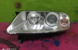 Фара ксенон левая для Volkswagen Touareg 2003 года на фотографиях