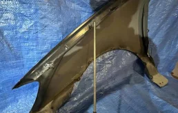 Крылья для Toyota Corolla 2003 года на фотографиях