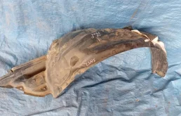 Подкрылок передний левый для Subaru Forester 2009 года на фотографиях