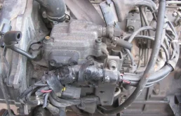 Двигатель без навесного для Mitsubishi L200 2009 года на фотографиях