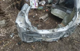 Панель кузова задняя для Nissan Tiida на фотографиях