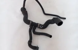 Патрубок радиатора верхний для Volkswagen Golf 2009 года на фотографиях